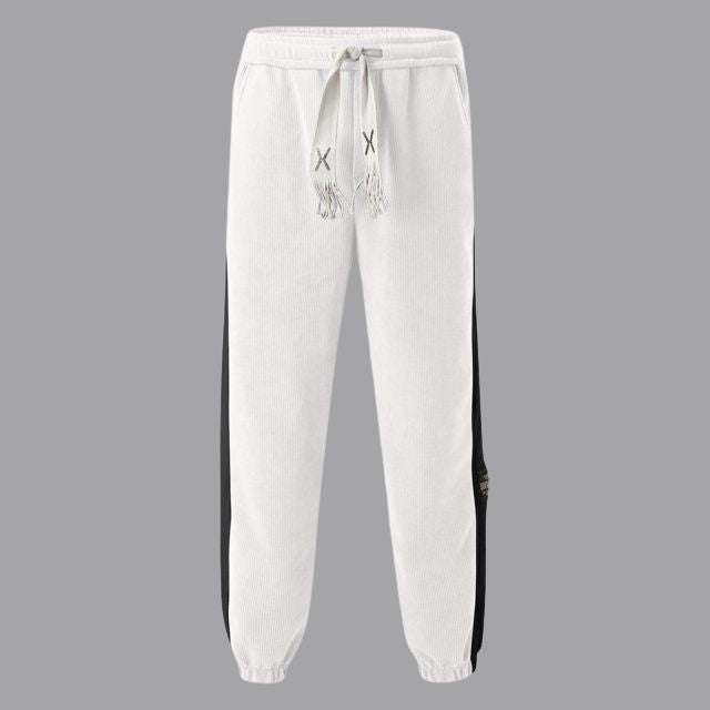 Joggers i vintage kordfløyel med kontrastfargede striper
