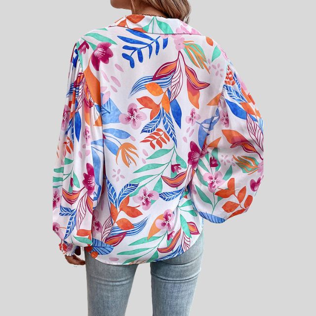 Flytende bluse med blomstertrykk