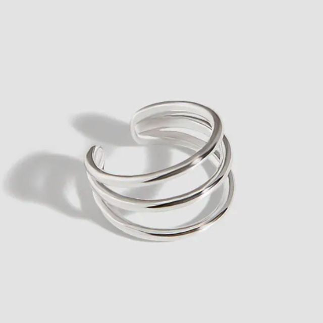 Spiralformet øremansjett med skinnende overflate