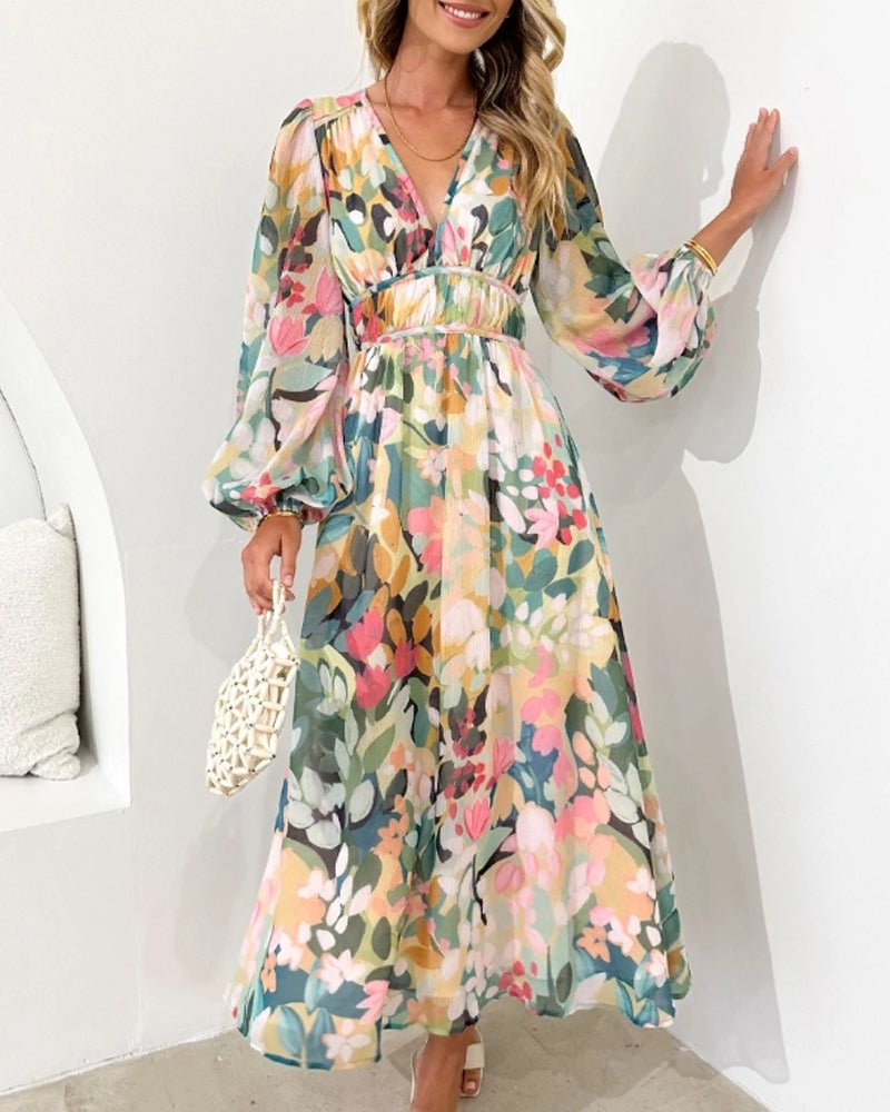 Violette | Midikjole i chiffon med blomstermønster, puffermer og V-hals