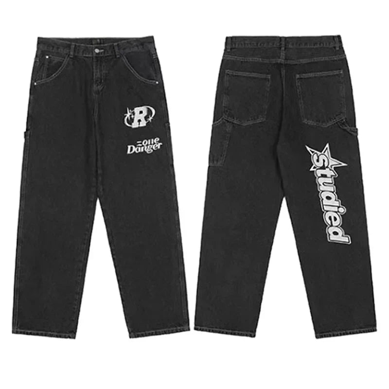 Vide jeans med slående grafisk trykk