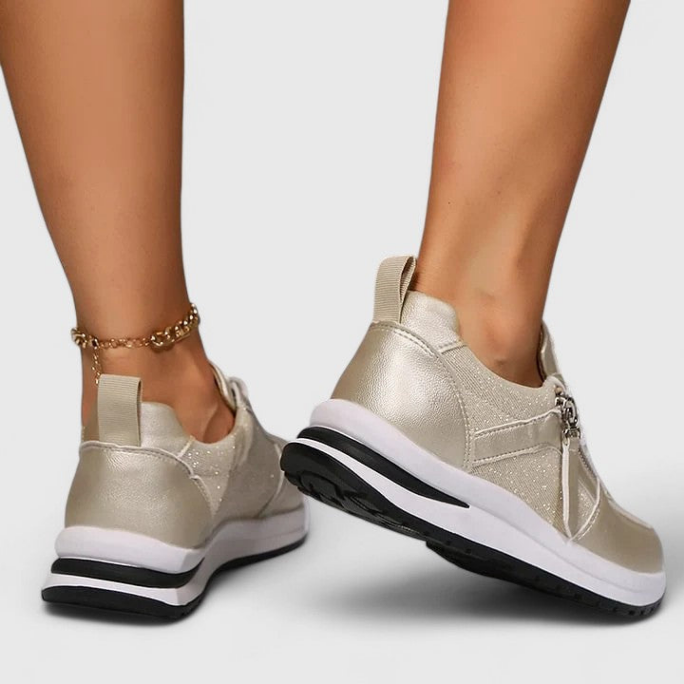 Ziva | Sneakers i metallisk glitterskinn med glidelås på siden og snøring