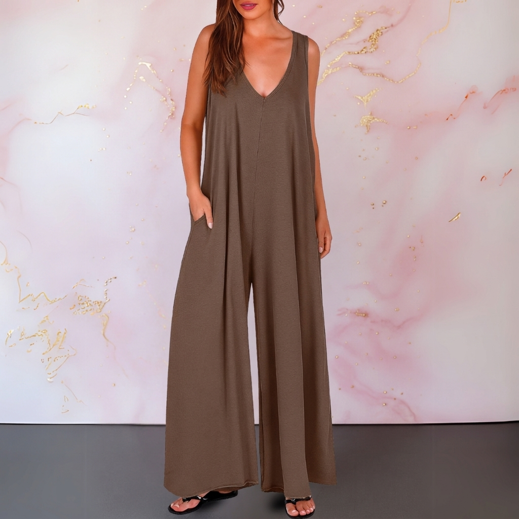 Zola | Elastisk ermeløs buksedress med V-hals og vide ben