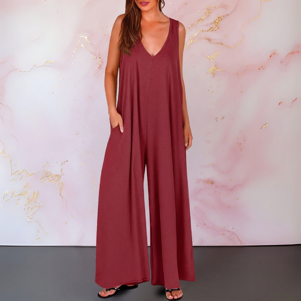 Zola | Elastisk ermeløs buksedress med V-hals og vide ben