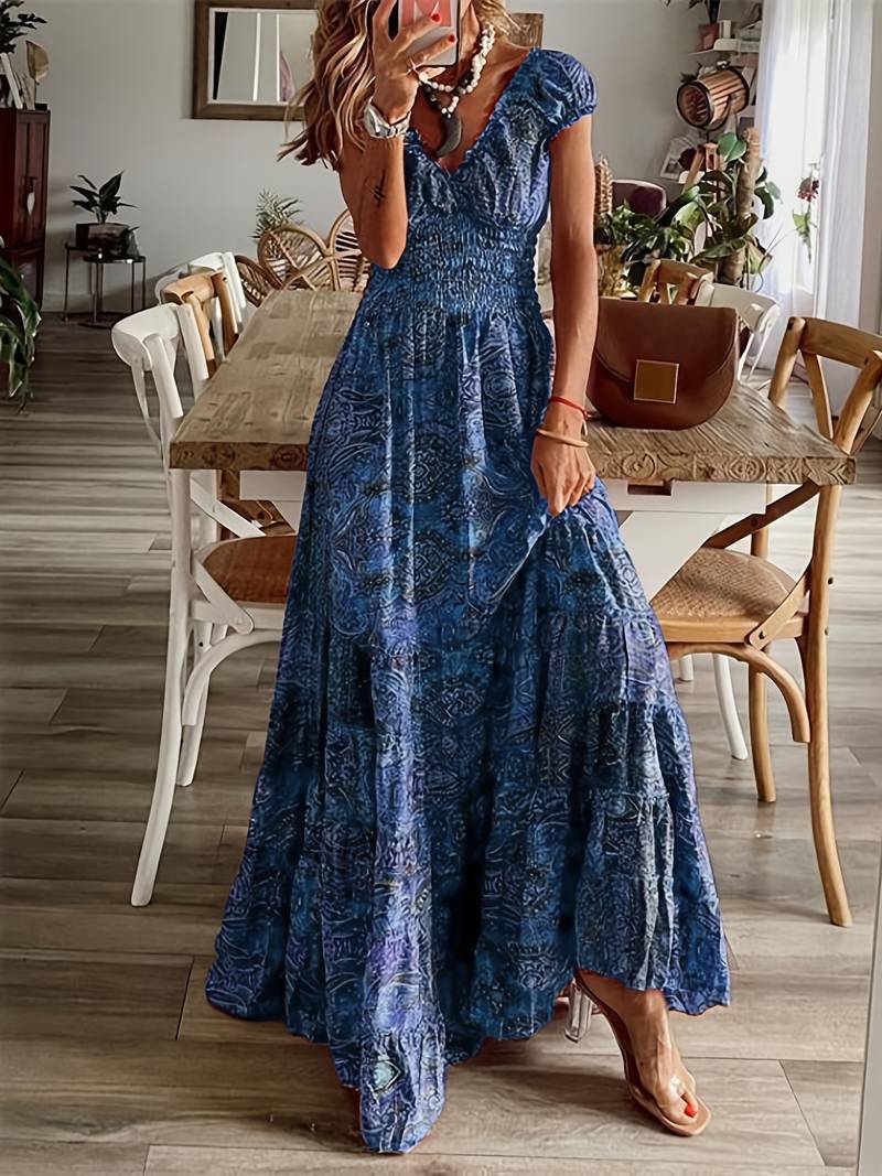 Lang kjole med volangutringning og blomstertrykk
