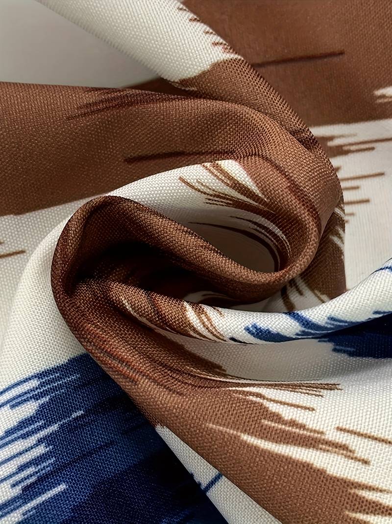 Ermeløs kjole med ikat-trykk