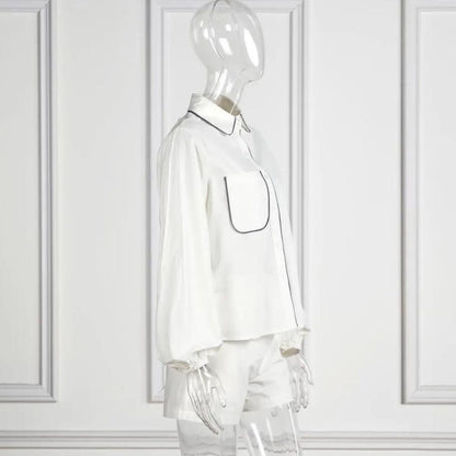 Elegant sett med skjortebluse og shorts