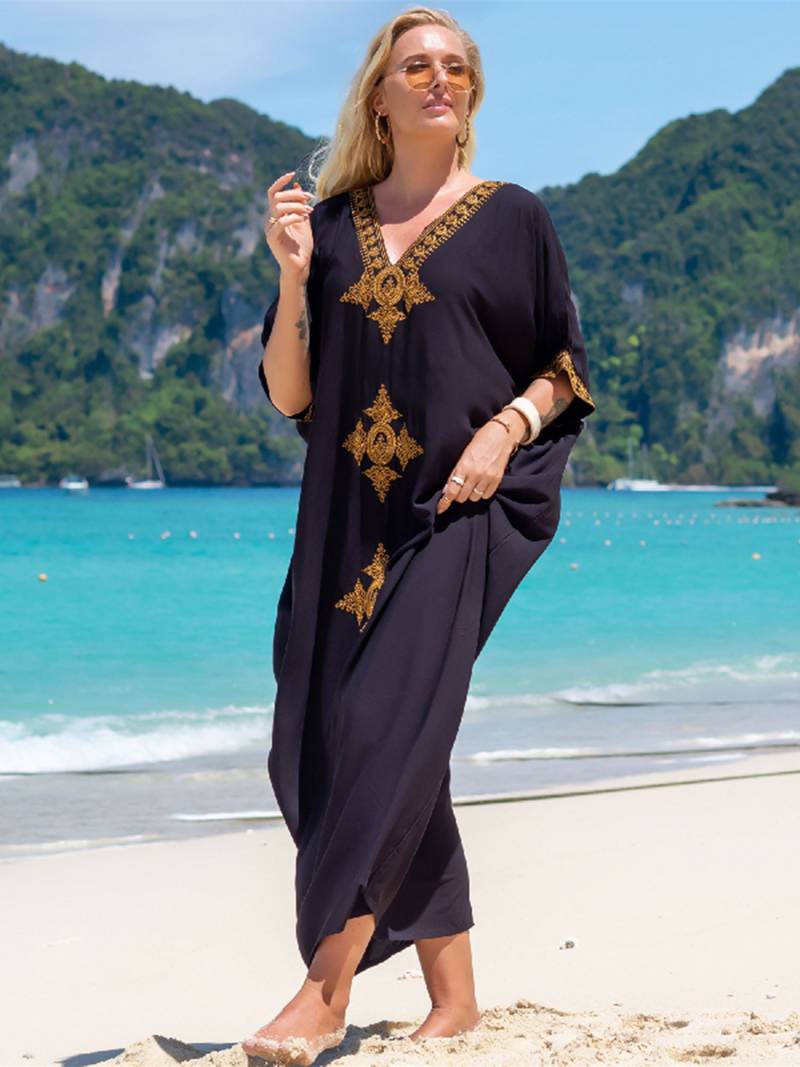Elegant retro strandkjole med V-utringning