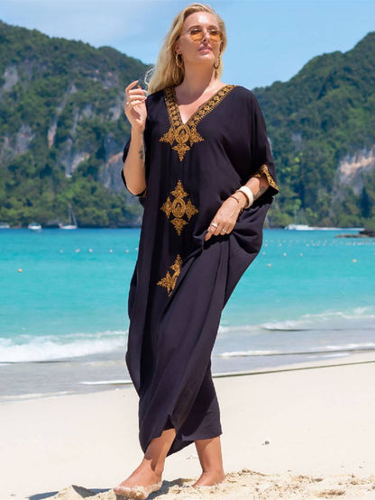 Elegant retro strandkjole med V-utringning