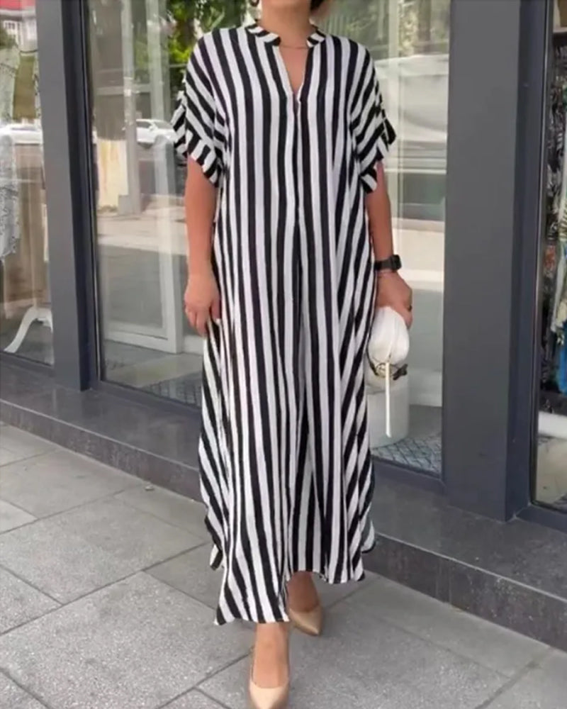 Elegant kjole med V-hals og striper