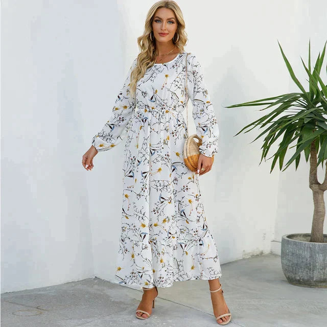 Fasjonabel blomstret kjole med rund halsutringning