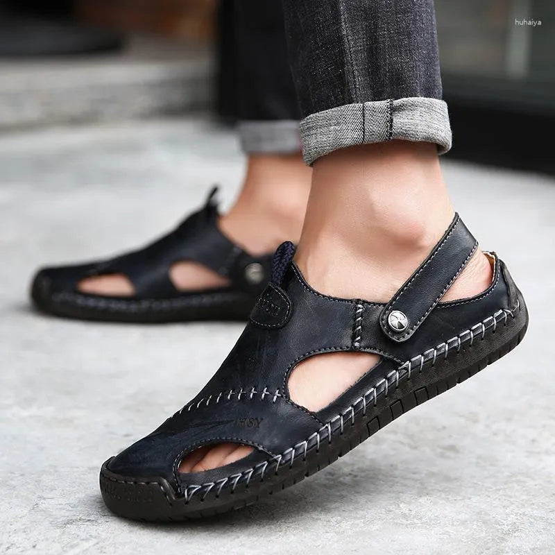 Håndlagde loafers i skinn med syningsdetaljer