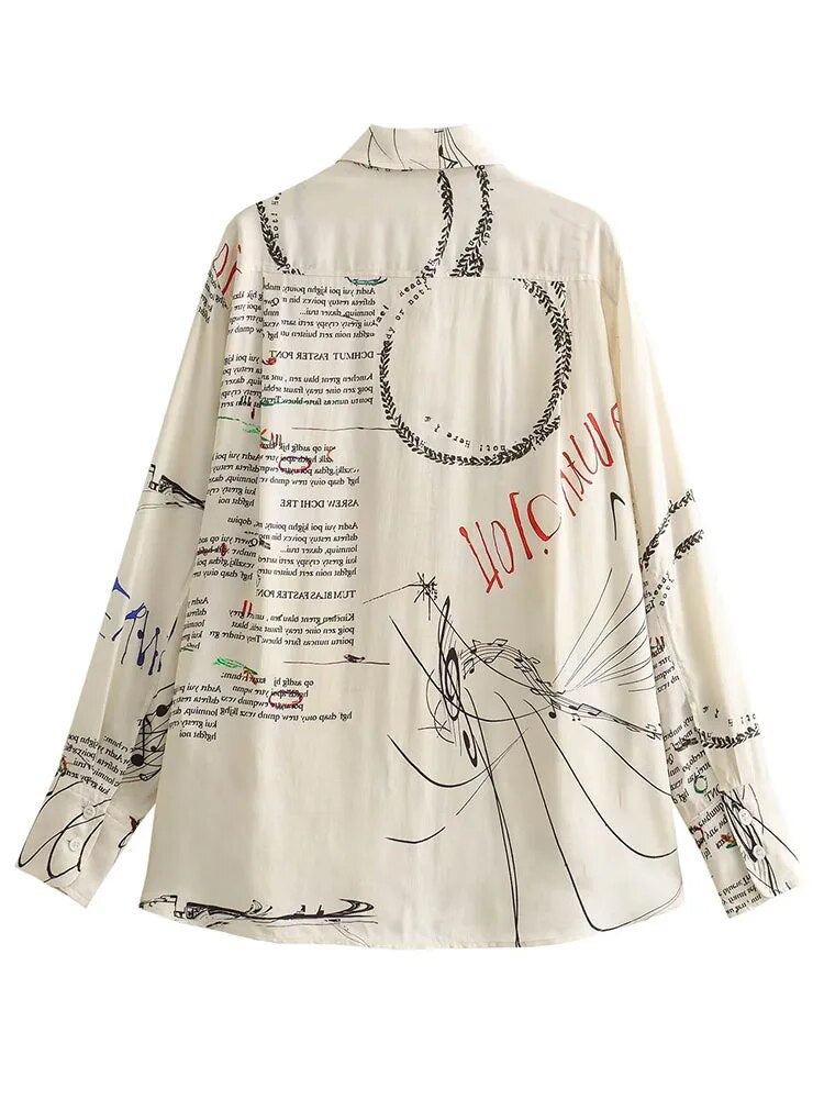 Trykt bluse med asymmetrisk snitt