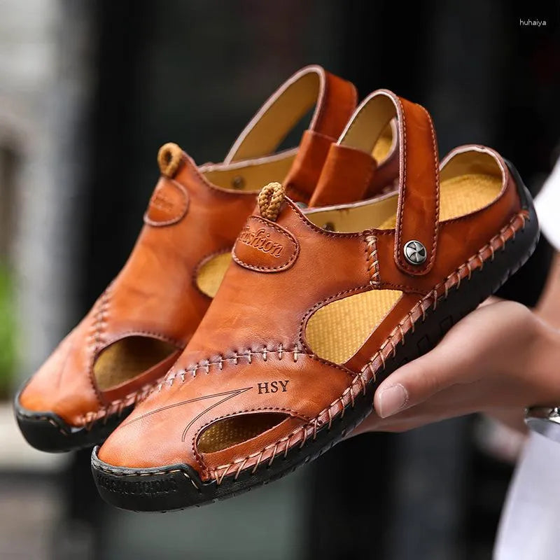 Håndlagde loafers i skinn med syningsdetaljer