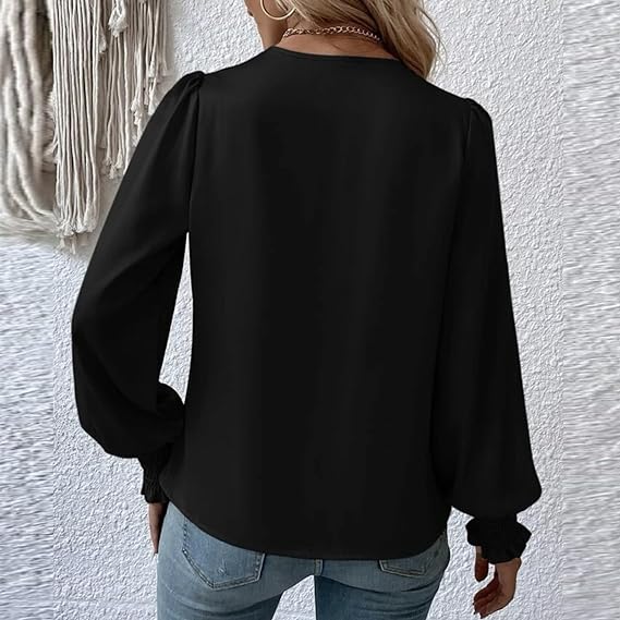 Elegant blusetopp med V-hals og ballongermer