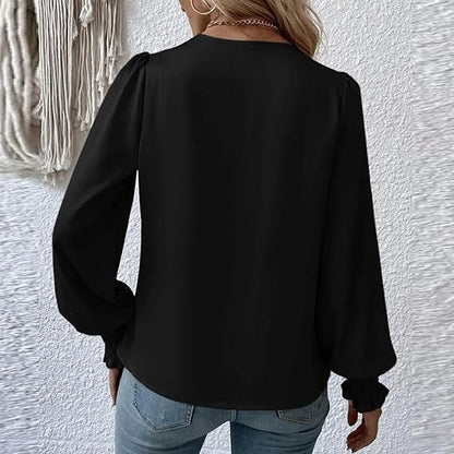 Elegant blusetopp med V-hals og ballongermer