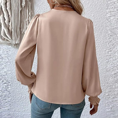 Elegant blusetopp med V-hals og ballongermer