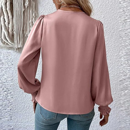 Elegant blusetopp med V-hals og ballongermer