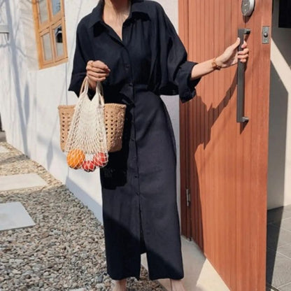 Elegant skjortekjole i silke med knappestolpe