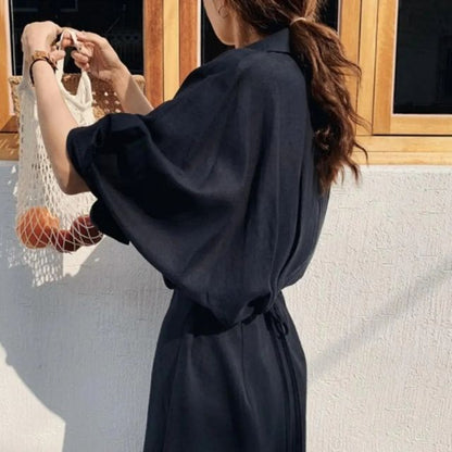 Elegant skjortekjole i silke med knappestolpe