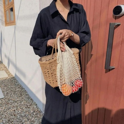 Elegant skjortekjole i silke med knappestolpe