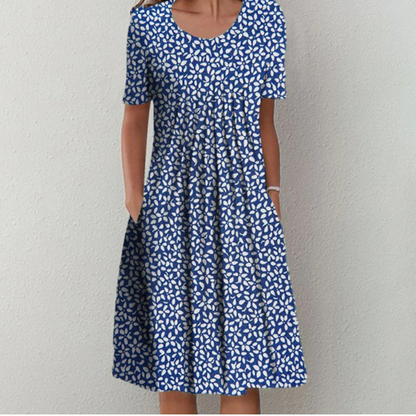 Blomstret kjole med volangmønster