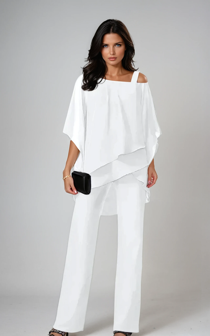 Aria | Todelt sett i chiffon med cold shoulder-topp og rettbukser – Hvit