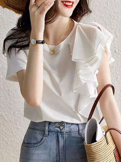 Elegant bluse med volanger og sømmer