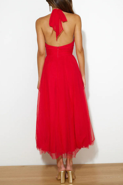 Celestia | A-formet midikjole i chiffonmesh med halterneck og rynket liv