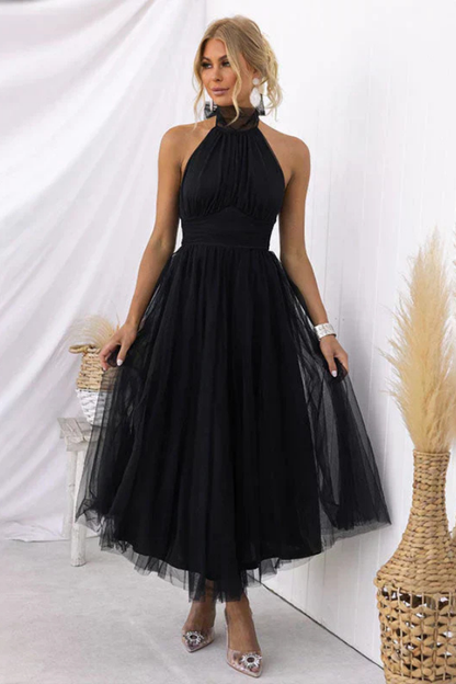 Celestia | A-formet midikjole i chiffonmesh med halterneck og rynket liv