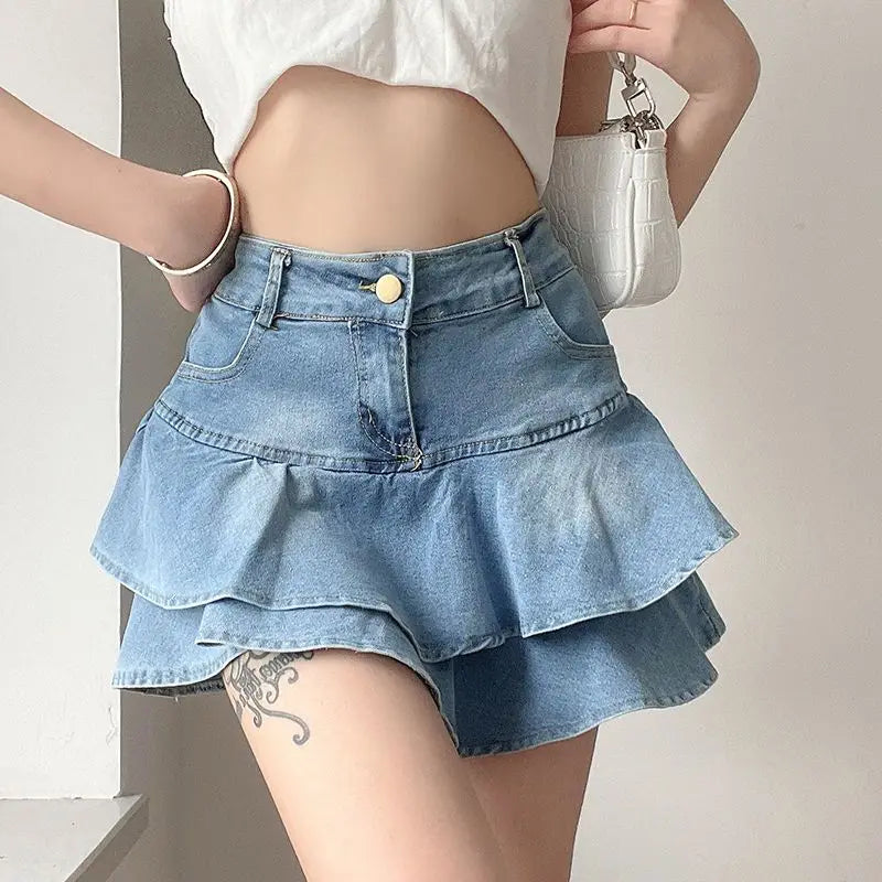 Denimshorts med volangkant