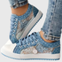 Dottie | Pustende sneakers i lerret med prikkemønster og snøring – Lyseblå