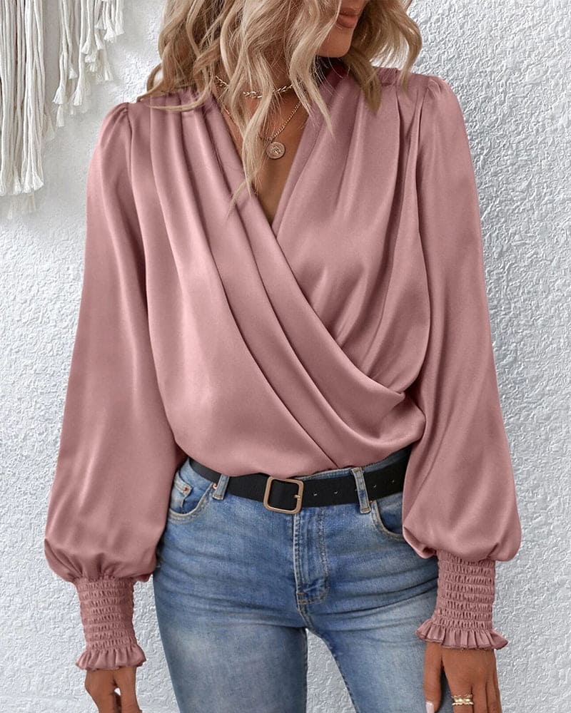 Elegant langermet omslagsbluse