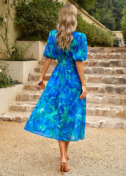 Flytende sommer midi-kjole med blomsterprint