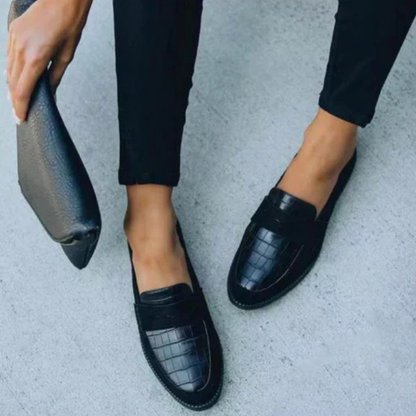 Harlow | Penny-loafers i svart skinn med krokodilleprege