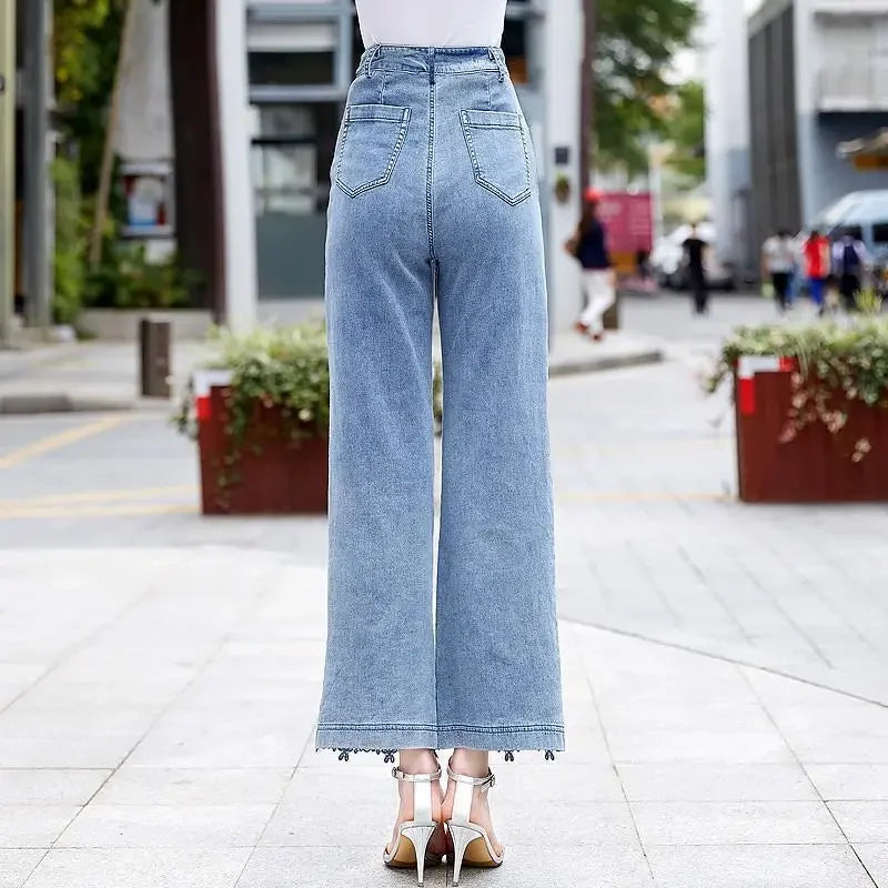 Jeans med høy midje og blonder i lappeteppe