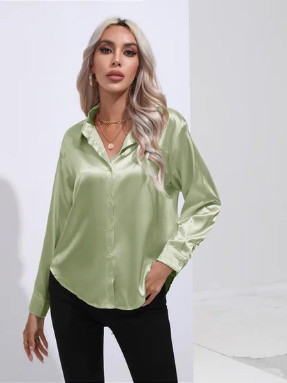 Elegant bluse i sateng