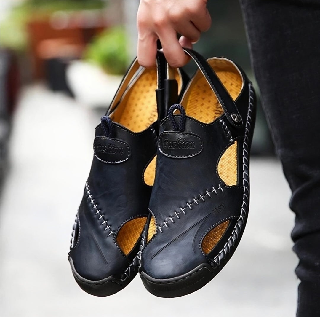 Håndlagde loafers i skinn med syningsdetaljer