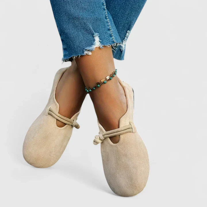 Jolene | Flate slip-on-sko i semsket skinn med taustropp