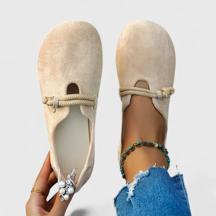 Jolene | Flate slip-on-sko i semsket skinn med taustropp