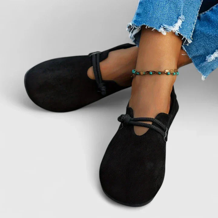 Jolene | Flate slip-on-sko i semsket skinn med taustropp