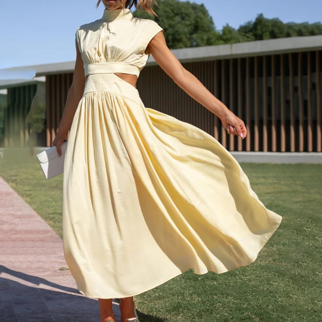 Elegant ermeløs kjole