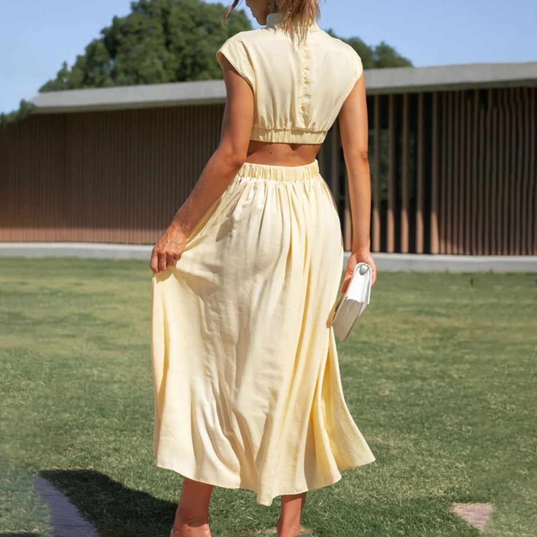 Elegant ermeløs kjole