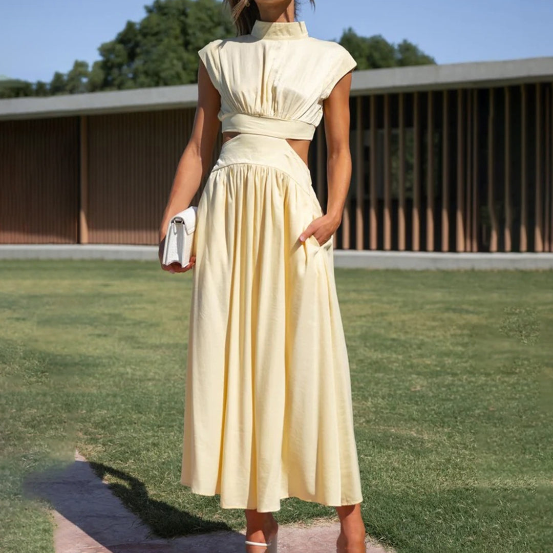 Elegant ermeløs kjole