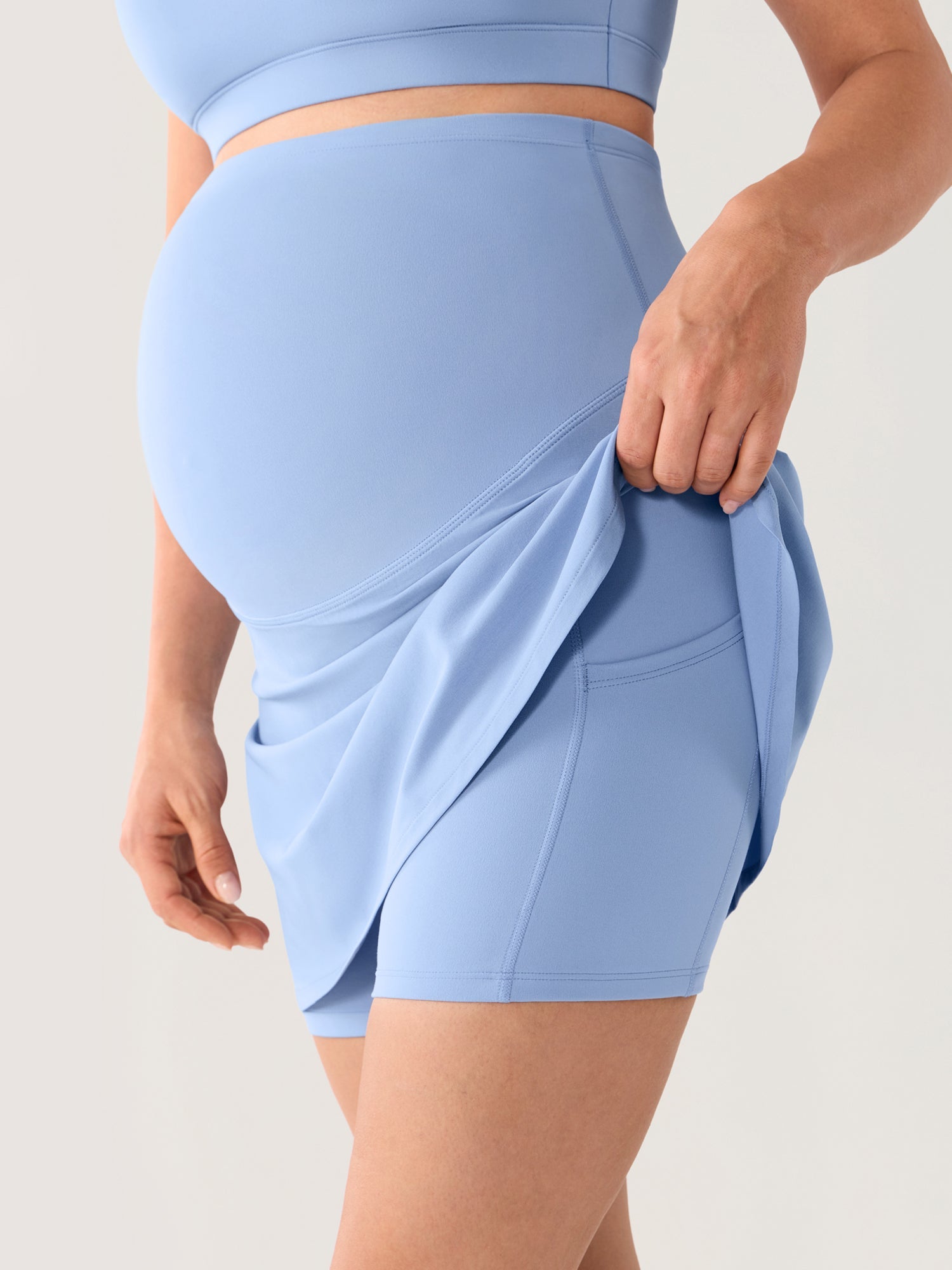 Gravidskjørt med innebygde shorts – A-fasong tennisskjørt for gravide