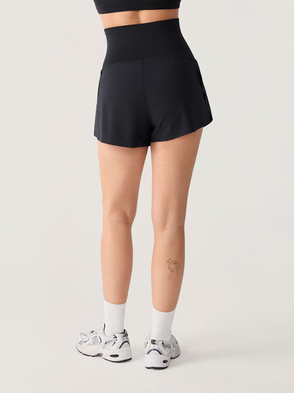 Gravidshorts med lommer – Bloomove™ dolphin shorts i dobbelt lag