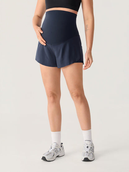 Gravidshorts med lommer – Bloomove™ dolphin shorts i dobbelt lag
