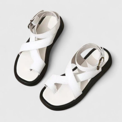 Mae | Flatform-sandaler i skinn med tåring og kryssende ankelstropp