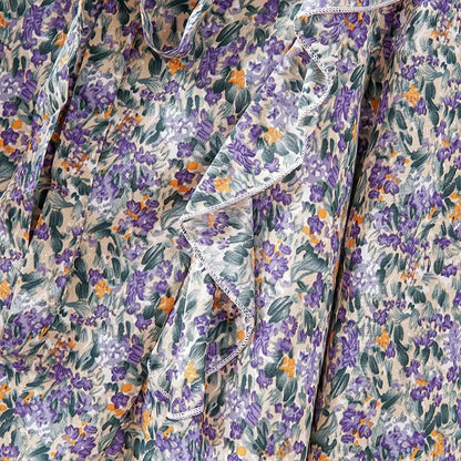 Blomstret bluse med sløyfekrage
