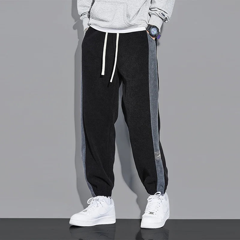 Joggers i vintage kordfløyel med kontrastfargede striper